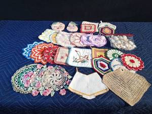 lot 38 image: Vintage handmade potholders and doilies and more