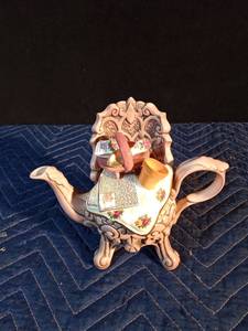 lot 43 image: Royal Albert Old Country Roses figural teapot designed by Paul Cardew
