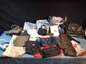 lot 217 image: Garment bags, purses, bottle wrap, leather travel bag and much more