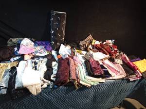 lot 195 image: Tote and a box of smoke free silky, satin and sheer material