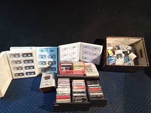 lot 189 image: A box, a 3 drawer cassette case and albums of cassettes