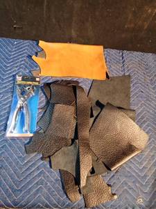 lot 178 image: New leather punch, pieces of leather and 1 pc vinyl