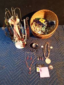 lot 168 image: Basket of jewelry with necklace hanger of jewelry