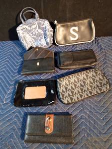 lot 169 image: Michael kors, Via Piaggi, Nine West, Amityville cowhide and more wallets and make up bags