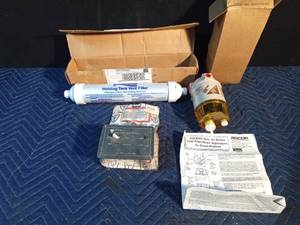 lot 159 image: New boat gas control panel, fuel filter, water separator, holding tank vent filter