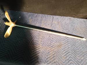 lot 107 image: New brass boat propeller with shaft