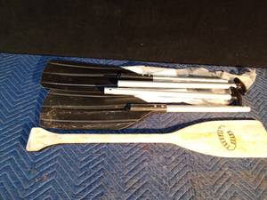lot 110 image: Set of 2pc paddles and 1 wood paddle