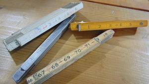 lot 38 image: Vintage Folding Tape Measures