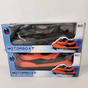 lot 12 image: Two New RC Motorboats Black And OrangeBlack Great Gift