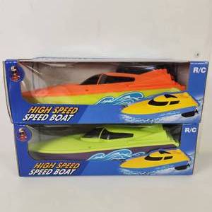 lot 15 image: Lot Of Two New High Speed Motor Boats OrangeGreen And GreenPurple