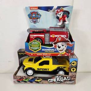 lot 21 image: Paw Patrol Marshall Fire Engine And Off Road Friction Driven Truck With Sounds And Lights