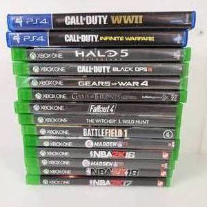 lot 28 image: Two PS4 Games Call Of Duty And 12 Xbox One Games Preowned Good Condition