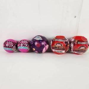 lot 30 image: Two LOL Surprise And Two Marvel Battle Balls Battle World And Ball