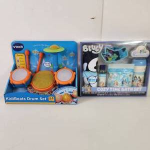 lot 35 image: Vtech Kidibeats Drum Set And Bluey Cozy Time Bath Set New