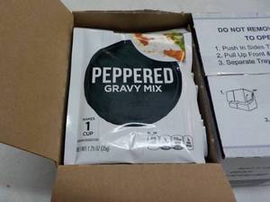 lot 112 image: 24 ct 1.25 oz Bags Peppered Gravy M...