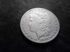 lot 11 image: 1891 CC Morgan Silver Dollar