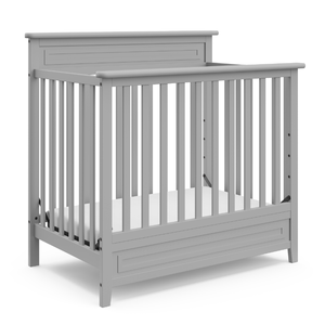 lot 132 image: Storkcraft Petal Mini 4-in-1 Convertible Crib - Gray
