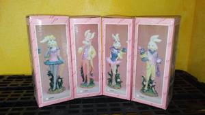 lot 52 image: Boy  Girl Rabbit Figurines (4) 9 in. Tall