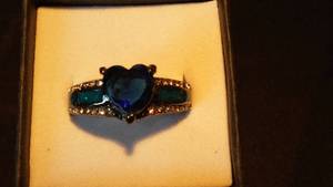 lot 963 image: Blue Heart Shaped Gemstone Ring.