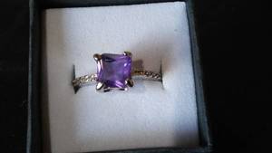 lot 964 image: Purple Square Shaped Gemstone Ring.