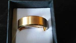 lot 969 image: Gold Colored Ring Band.