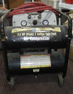 lot 680 image: Twin Tank Air Compressor.