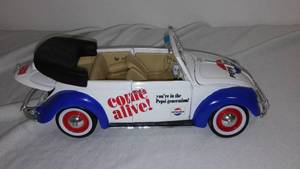 lot 724 image: Maisto 118 Volkswagen PEPSI COLA Diecast Model.