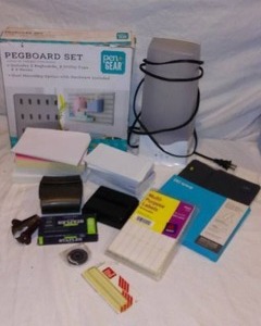 lot 478 image: Office Pegboard set, Light, Index Cards, and more.
