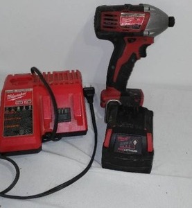 lot 809 image: Milwaukee Impact Driver, Battery and Charger.