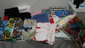 lot 866 image: Cotton, Fleece, Flannel Fabric Remnants in Covered tote.