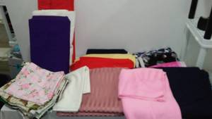 lot 867 image: Rib Knit, Cotton, Flannel Fabric Remnants in. Covered tote.