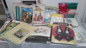 lot 882 image: Cross-stitch Patterns, Kits and More.