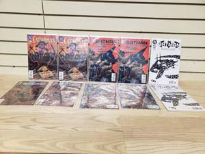 lot 7 image: Lot of 10 BatmanCat woman  Comic Books