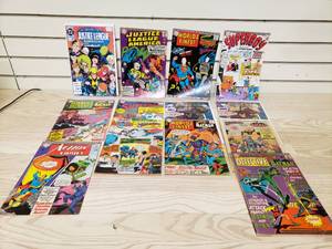 lot 23 image: Lot of Justice League, Super Boy, Batman, Super Man Comic Books