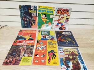 lot 25 image: Lot of Iron Man, The Twilight Zone, Mighty Mouse, Wacky Duck, Girl From U.N.C.L.E, LT Robin Crusoe, Robot Fighter Comic Books