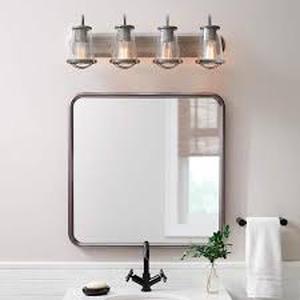 lot 31 image: Home Decorators Collection Georgina 30 in. 4-Light Weathered Iron Industrial Rustic Vanity with Clear Seeded Glass Shades and Cage Accents    Customer Returns See Pictures