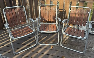 lot 21 image: Three Vintage Wooden Accented Folding Patio Chairs
