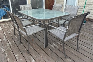lot 14 image: Glass Top Patio Table with Six Chairs
