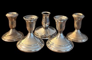 lot 223 image: Five Vintage Sterling Weighted Candle Holders