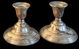 lot 222 image: Pair of Vintage Sterling Weighted Reinforced Holders by W.M.Rogers MFG Co.