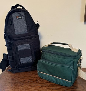 lot 206 image: Two Camera Bags including a Lowepro Slingshot Camera Bag