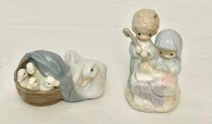 lot 186 image: Lladro 4895 Ducks Mother Duck with 4 Baby Ducklings in a Basket and 1996 Precious Moments Nativity Ornament