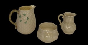 lot 184 image: Three Vintage Belleek Ireland Lotus including Belleek Cream Pitcher