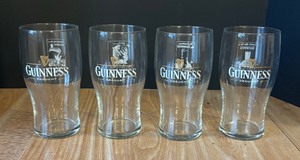 lot 459 image: Four Guinness Beer Glasses