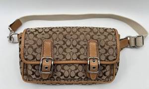 lot 36 image: Coach Signature Canvas Belt Bag with Leather Trim