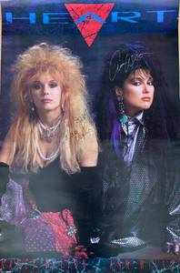 lot 254 image: Signed Heart Band Poster Featuring Ann and Nancy Wilson