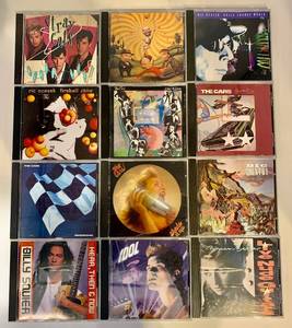 lot 305 image: Collection of 12 Rock and New Wave Music CDs
