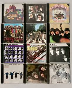 lot 405 image: Collection of 12 The Beatles Music CDs