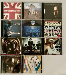 lot 409 image: Collection of 11 Rock Music CDs Featuring Iconic Albums including The Doors