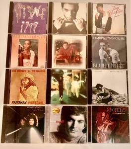 lot 416 image: Collection of 12 Music CDs including Prince and Whitney Houston